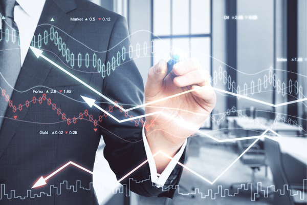 ilustrasi trader menulis grafik trading, menentukan apa itu leverage - Ultima Markets